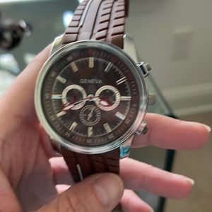 Geneva watch. Needs battery.